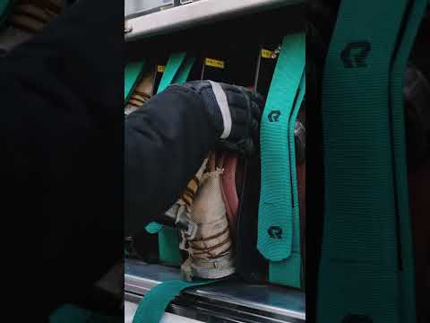 Fireman Extruding Water Hose Out of Firetruck [Short]