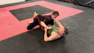 Cuffing technique using Omoplata 