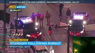 Police Pursue Suspect Carrying a 