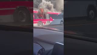 Bus Erupts in Flames on Side of Expressway Due to Mechanical Issue