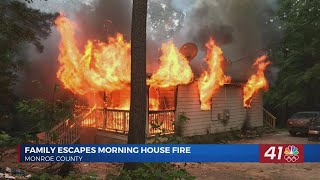 Family of eight escapes morning house fire in Monroe County