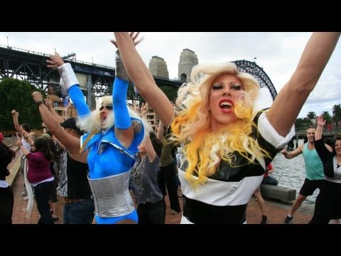 150 dancers surprised sightseers on Sydney Harbour with a Dance-Off Flash Mob on Saturday May 1st. Organised by DJ Dan Murphy with two dance troupes led by Australia's favourite drag queens, JOYCE MAYNGE and DECODA SECRET. Thank you to all the volunteer dancers, camera-people and support crew! Want to be part of the next one? Join Rock Your Box: www.facebook.com SAY CHEESE Party Details: www.saycheeseparty.com.au UPDATE 7th May - Perez Hilton loves the video! http UPDATE 8th May - Video on Channel 7's Weekend Sunrise au.tv.yahoo.com UPDATE 9th May - Nelson Aspen tweets! twitter.com UPDATE 12th May - Dannii Minogue tweets & facebooks about her song being included! twitter.com â¢ Starring: Joyce Maynge & Decoda Secret www.facebook.com www.facebook.com â¢ Choreography: David Olsen â¢ Camera: Travis Conneeley Frankie Shin Lee Jenkins Mark Chisholm â¢ Editing: Simon Murray â¢ Direction & Music: Dan Murphy www.facebook.com â¢ Rehearsal Spaces - Thank You: Arq Nightclub & The Midnight Shift www.arqsydney.com.au www.themidnightshift.com â¢ Contact: rockyourbox@mac.com