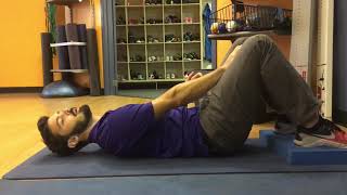 Hooklying Hip Tilt with Reach