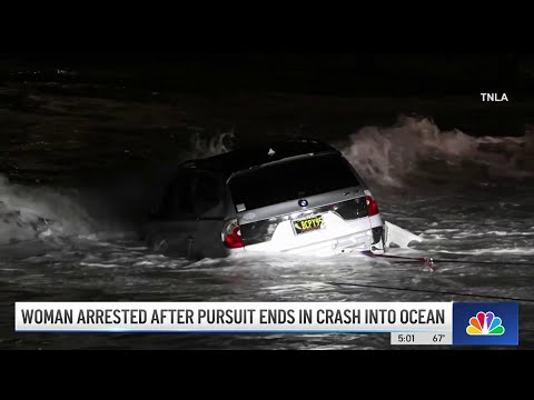 Woman arrested after driving car into ocean during pursuit