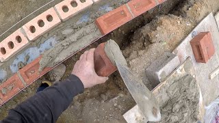 OLD BOYS bricklaying the footings!