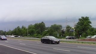 LIRR: EB Train #2710 Passes By Massapequa with a Storm Looming Overhead