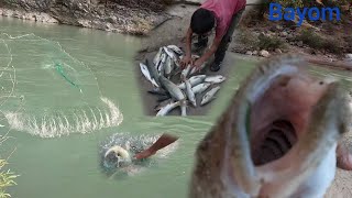 Very beautiful and attractive fishing by the nomadic man in the black river