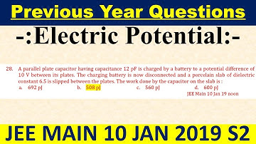 A parallel plate capacitor having capacitance 12 pF is charged by a battery to a potential differenc