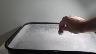 Aluminum Tippy Top on Flat Ice Melting 2