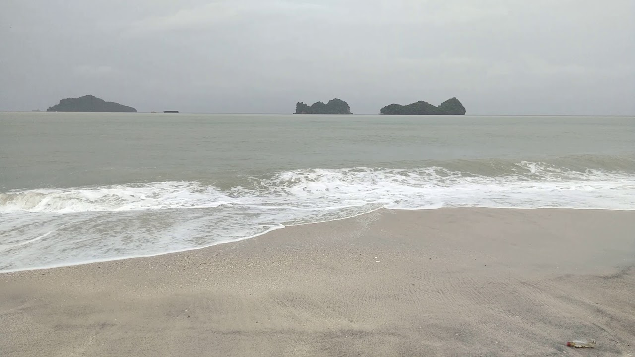 raining and raising water on beach. - YouTube