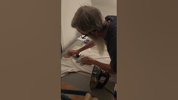 Linocut Block Print of my badger on a small shirt #printmaking #linocut #shirt #badger