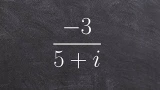 Algebra 2 - Learn how to divide a real number by a complex number by simplifying, -3/(5 + i)