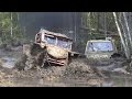 Off-Road vehicle mud race , wet forest. Rugaji