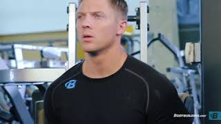 Seated Back Extension  Exercise Videos & Guides  Bodybuilding com