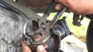 How to remove a spare tire and fix safety latch design flaw