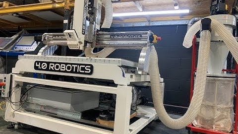 40 ROBOTICS Model 16 Executive CNC router CNC cutting a Traffolyte JIG SAW