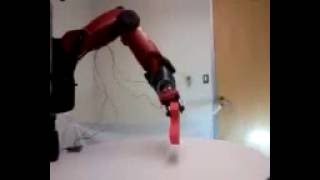 Baxter Grasps and Moves a Block