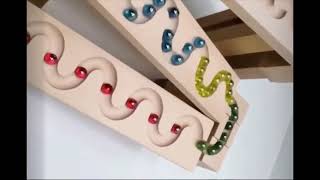 Enchanting Wooden Marble Run Featuring a Hypnotic Vortex