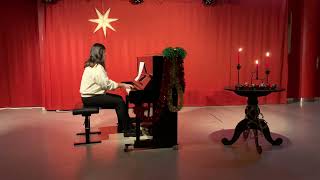 Arminda Apaza Cutile spelar Jul jul strålande jul