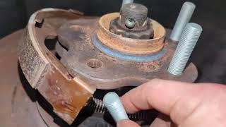 how to install 20 mm extended lug studs on R33 GTR without removing rear axle hub and knuckle