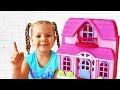 Diana and Roma pretend play with toy house
