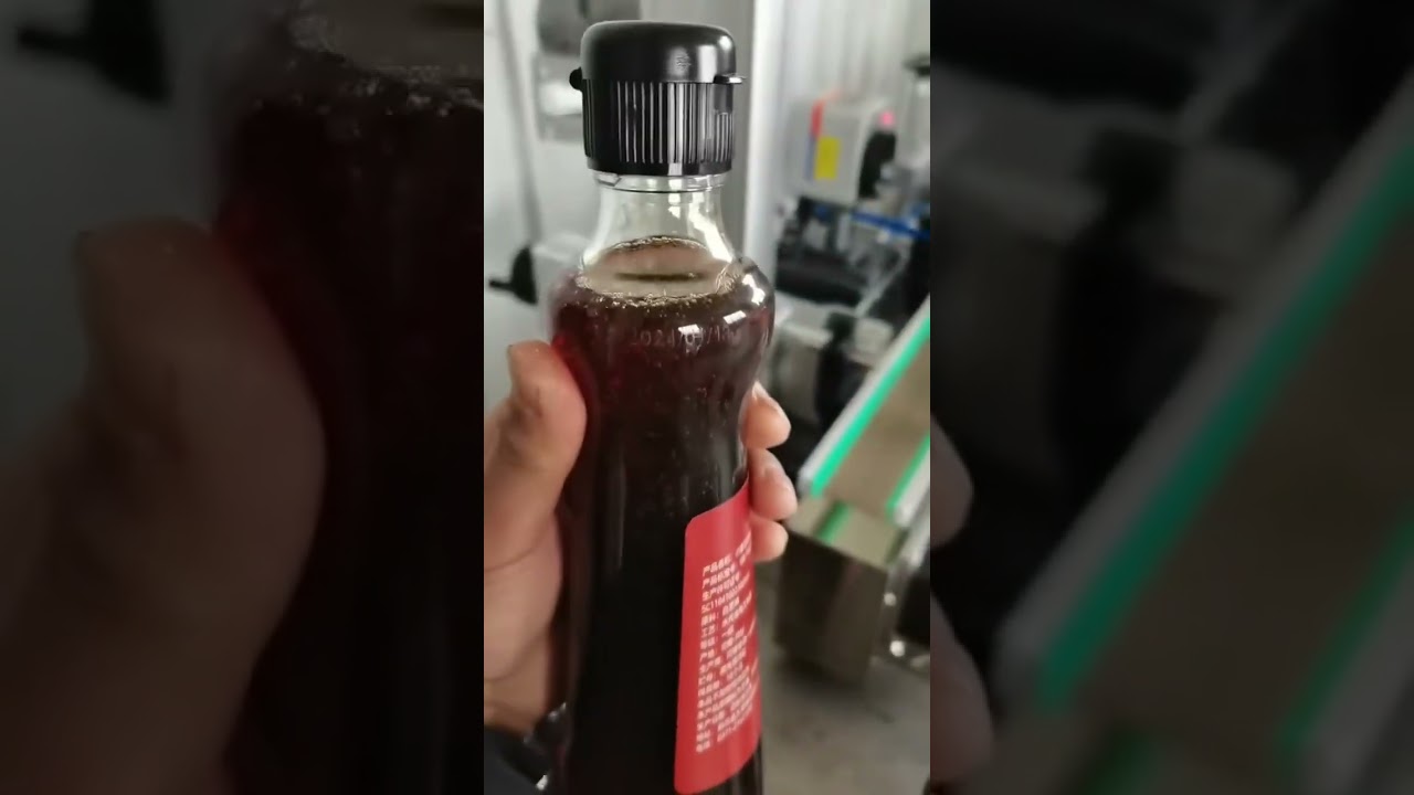 Conical bottle labeling machine.  