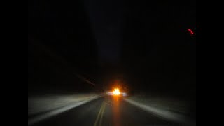 Snowy morning commute to work behind snow plow