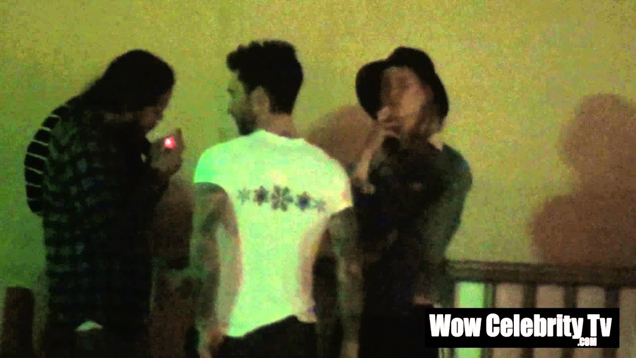 Adam Levine and Behati Prinsloo go out for a smoke break at performance in  Hollywood