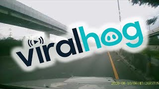 Truck Topples Over After Colliding With Barrier || ViralHog