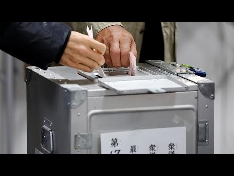 Japan votes in early election as Abe seeks record fourth term