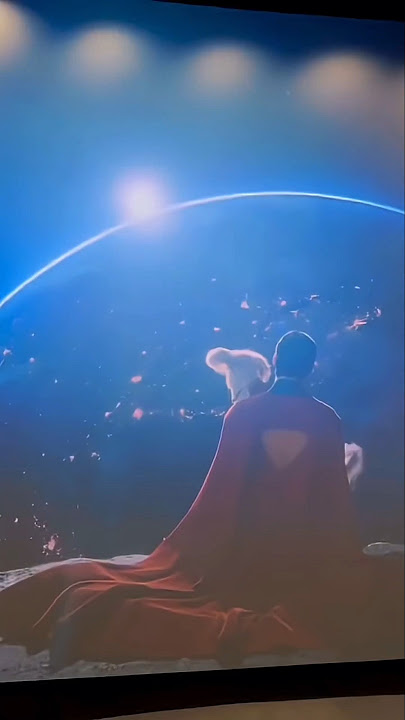 Why is Superman sitting on the moon mid-credits?