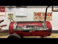 I made a mini-smoker/ grille out of an old air compressor.