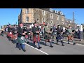March of the Stewards led by massed pipers to the 2021 Argyllshire Gathering Oban Highland Games