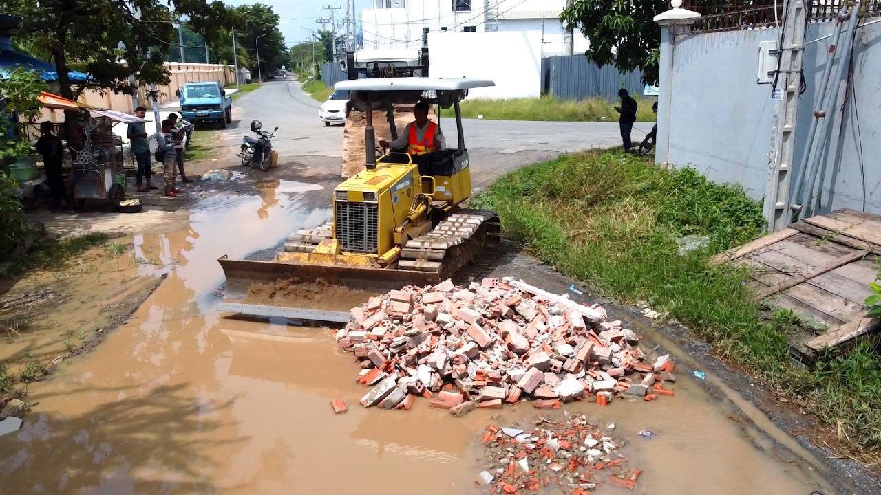 Amazing!!! First Start New Project REPAIRING ROAD By D20P KOMATSU DOZER Pushing CONSTRUCTION WASTE