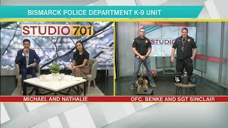 Officer Benke and his K-9 partner Mesa show off their new training equipment