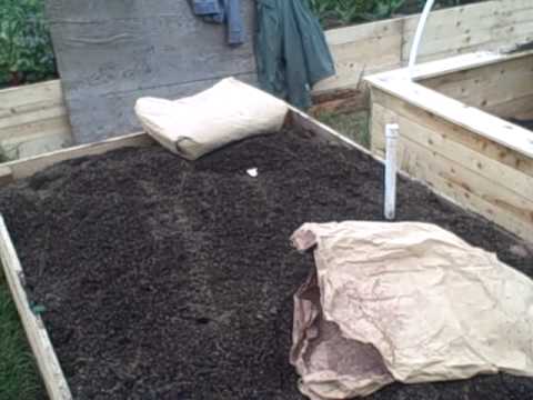 50 Cubic Yards of compost in front of the house! - YouTube
