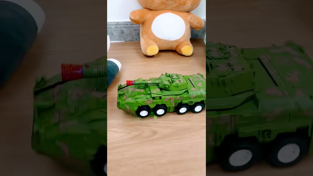 Tank robot toy switching bw Two forms automatic light and music 