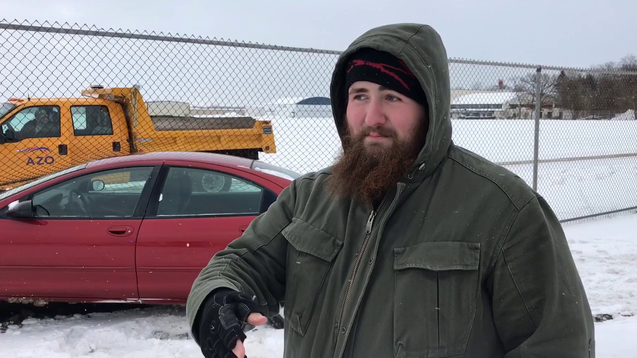 Car slides on ice, crashes into fence YouTube