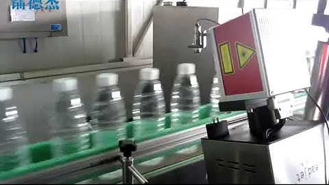 Leadjet Co2 laser making machine printing on PET water bottles,
