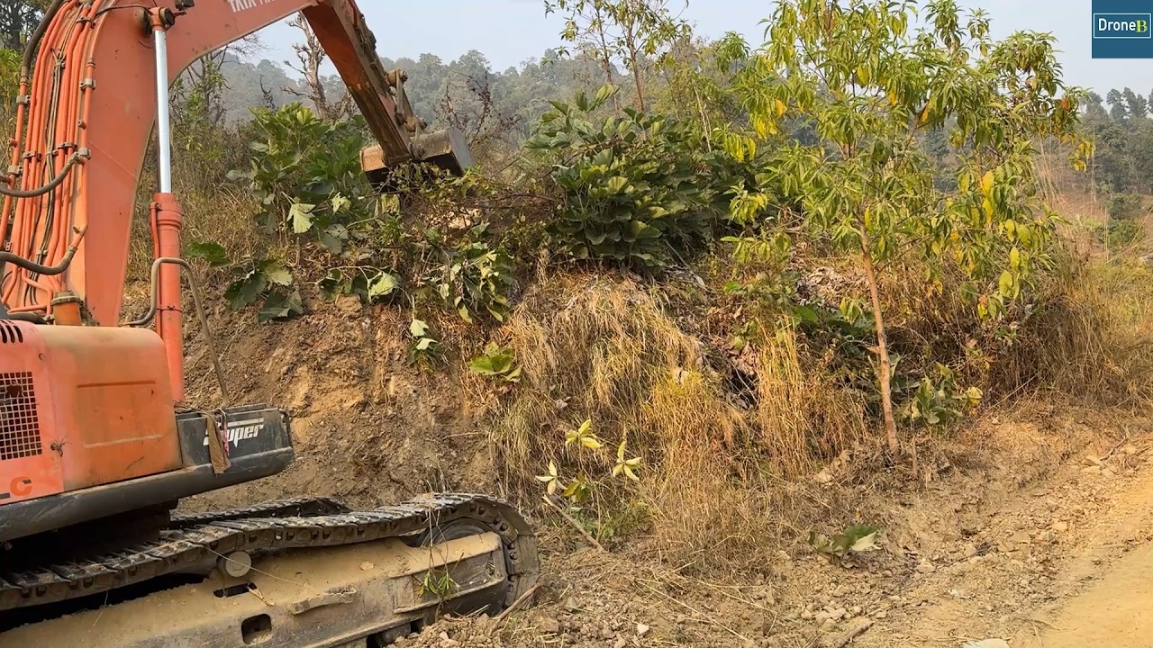 Widening this Narrow Mountain Road for Safer Travels-Excavator Hill Cutting