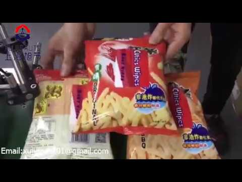 filled Chips bag  labeling machine