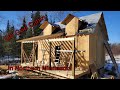 Off grid cabin build in Northern Minnesota Part 17b rafters on the porch