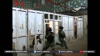 Memorial service held for Chinese embassy guard