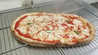 Stesura e cottura pizza al metro