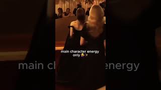 Ariana Grande Turns Red Carpet Interruption into Iconic Spin