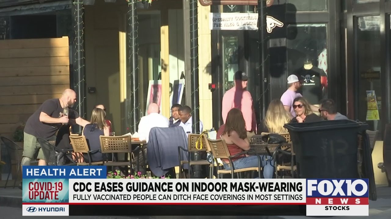 CDC eases guidance on mask-wearing for those vaccinated - YouTube