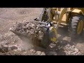 Mbl crusher bucket on skid loader and backhoe loaders