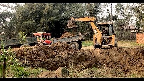 JCB Backhoe Loader Digging A Pond For A Fish Farm - JCB Loading Soil On Tractor 2