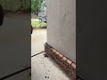 Practical Process of Prying and Shifting a Concrete Wall Base Using a Steel Crowbar