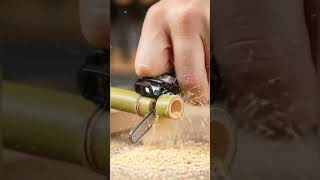 A Tiny Mini Chainsaw Cut Green Bamboo